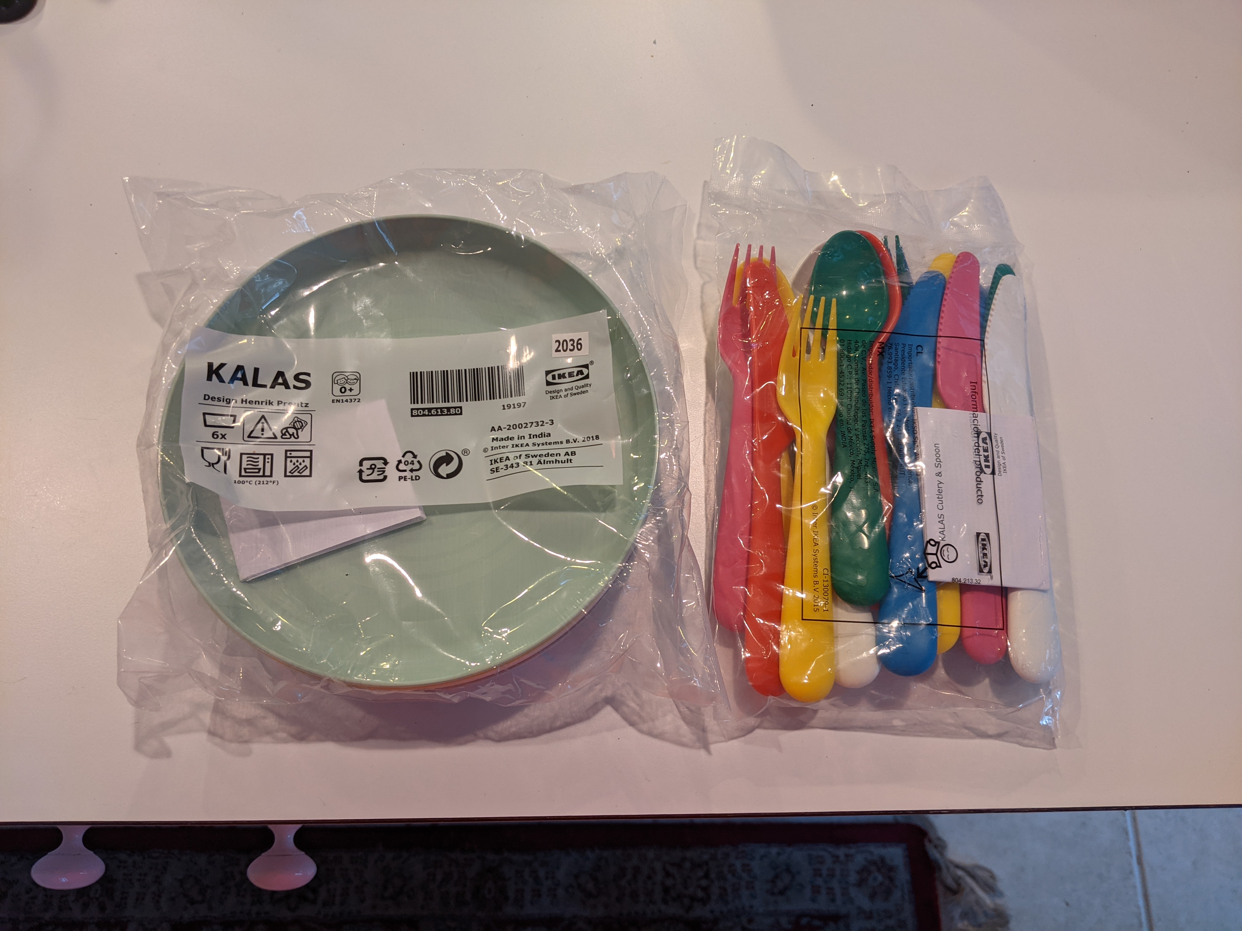 Classy plastic dishes and kid-friendly utensils